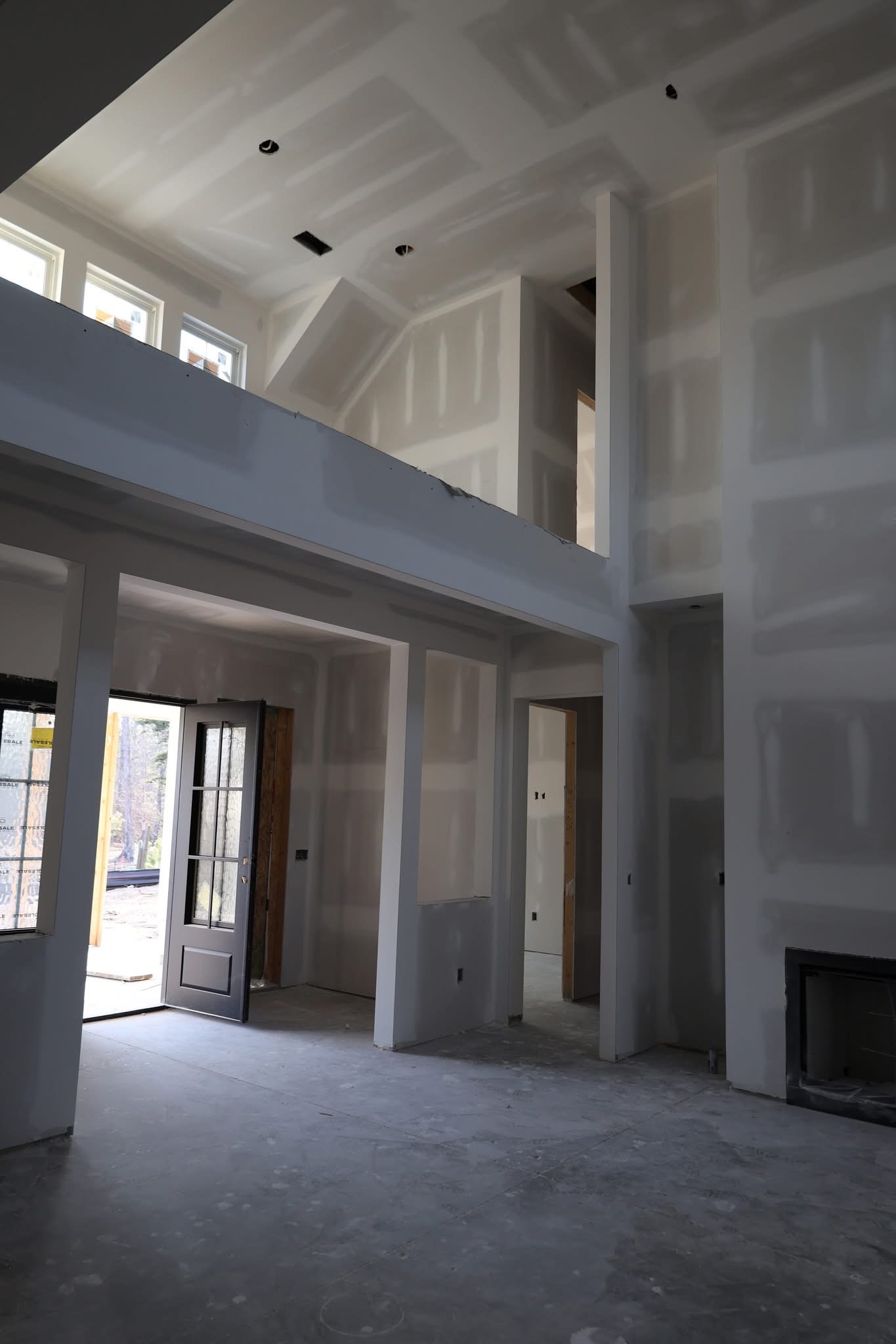 Modern farmhouse framed and wrapped during construction