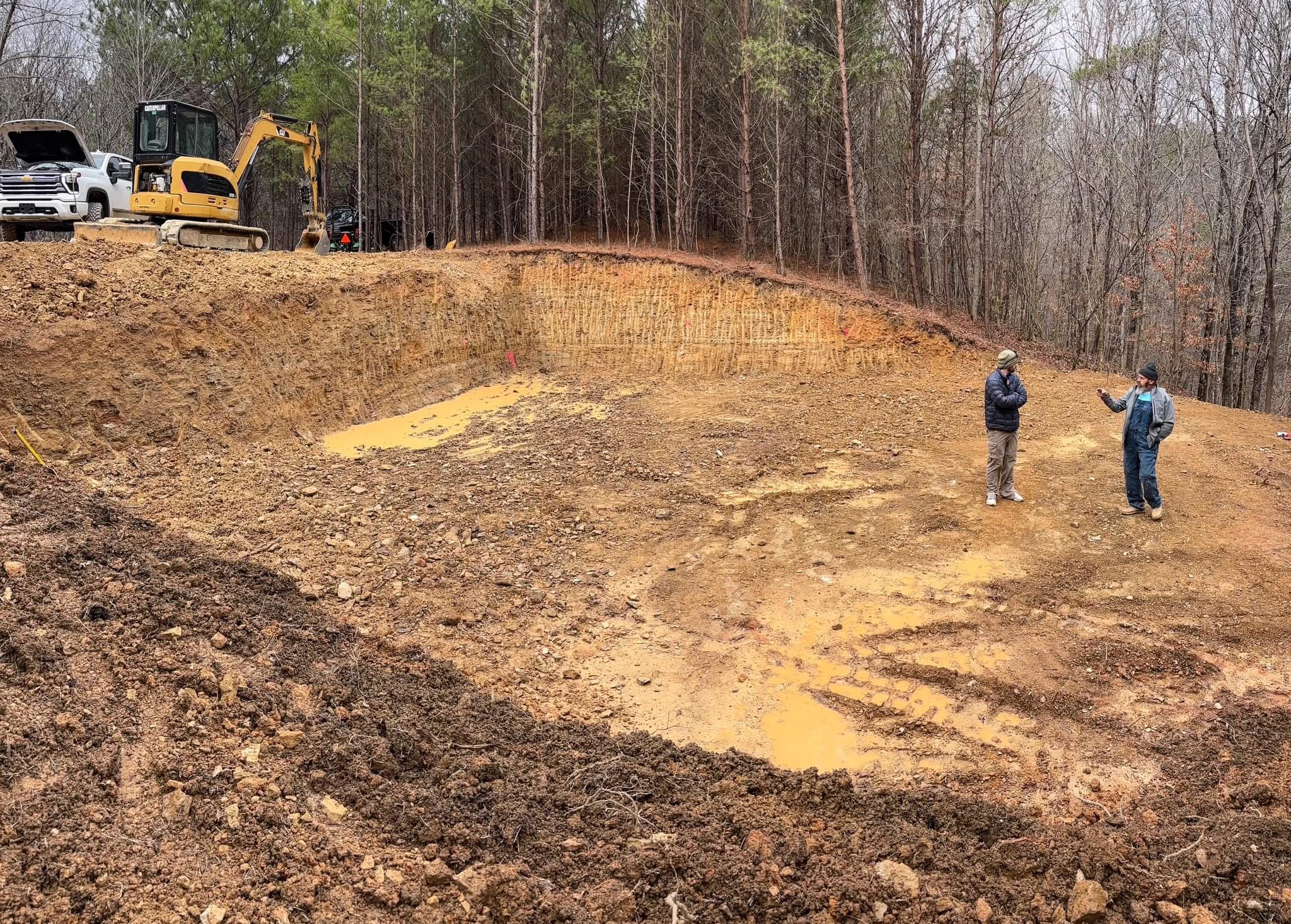 Early grading and survey work at the Modern Retreat site in Warrior