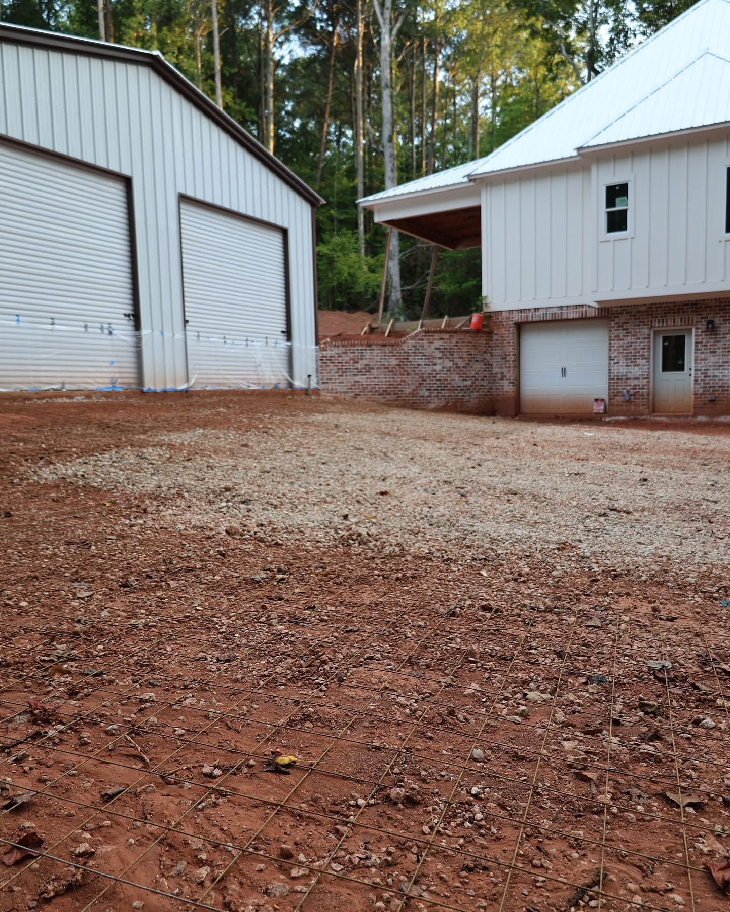 Detached workshop viewed from the drive